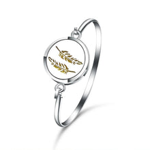 Charger l'image dans la galerie, Bracelet diffuseur d'huile essentielle "Plumes"
